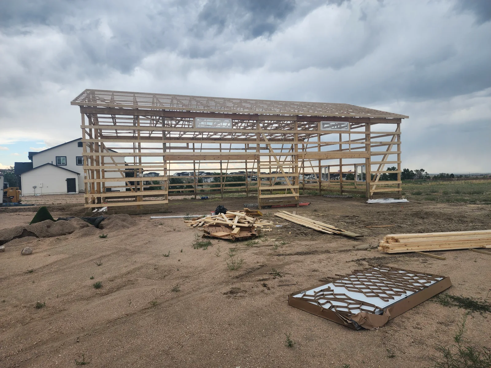Pole barn framing in progress near Colorado Springs